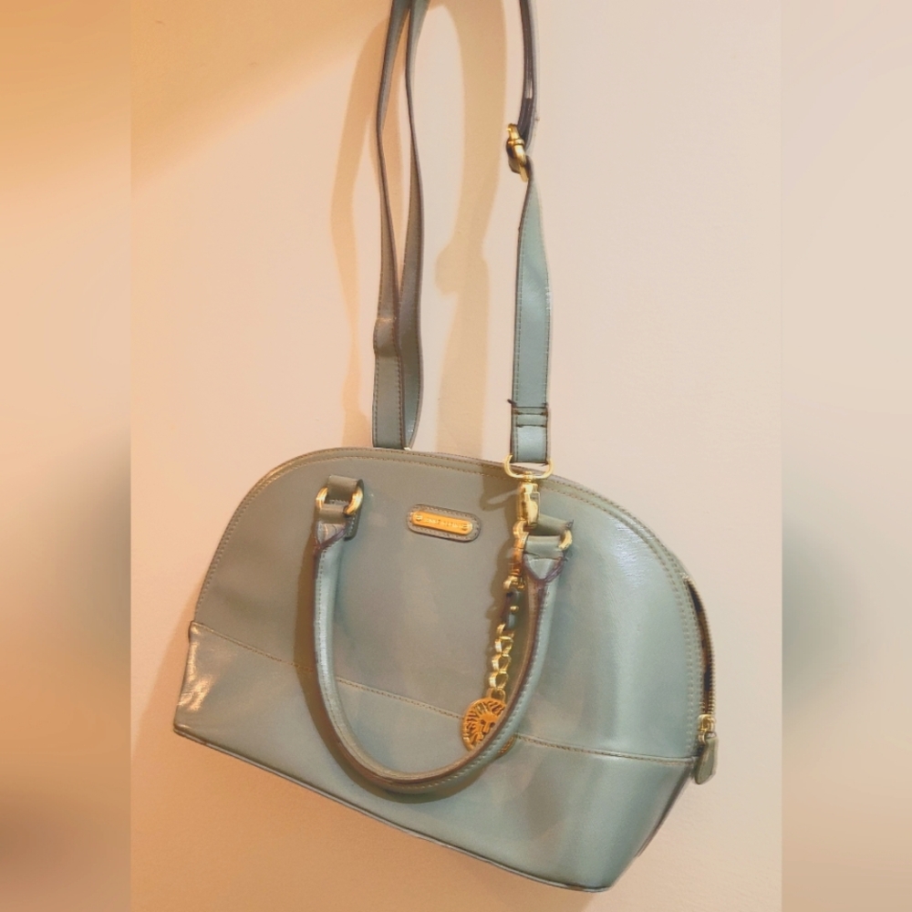 Anne Klein Tiffany blue purse with gold tone fittings and crossover strap GUC